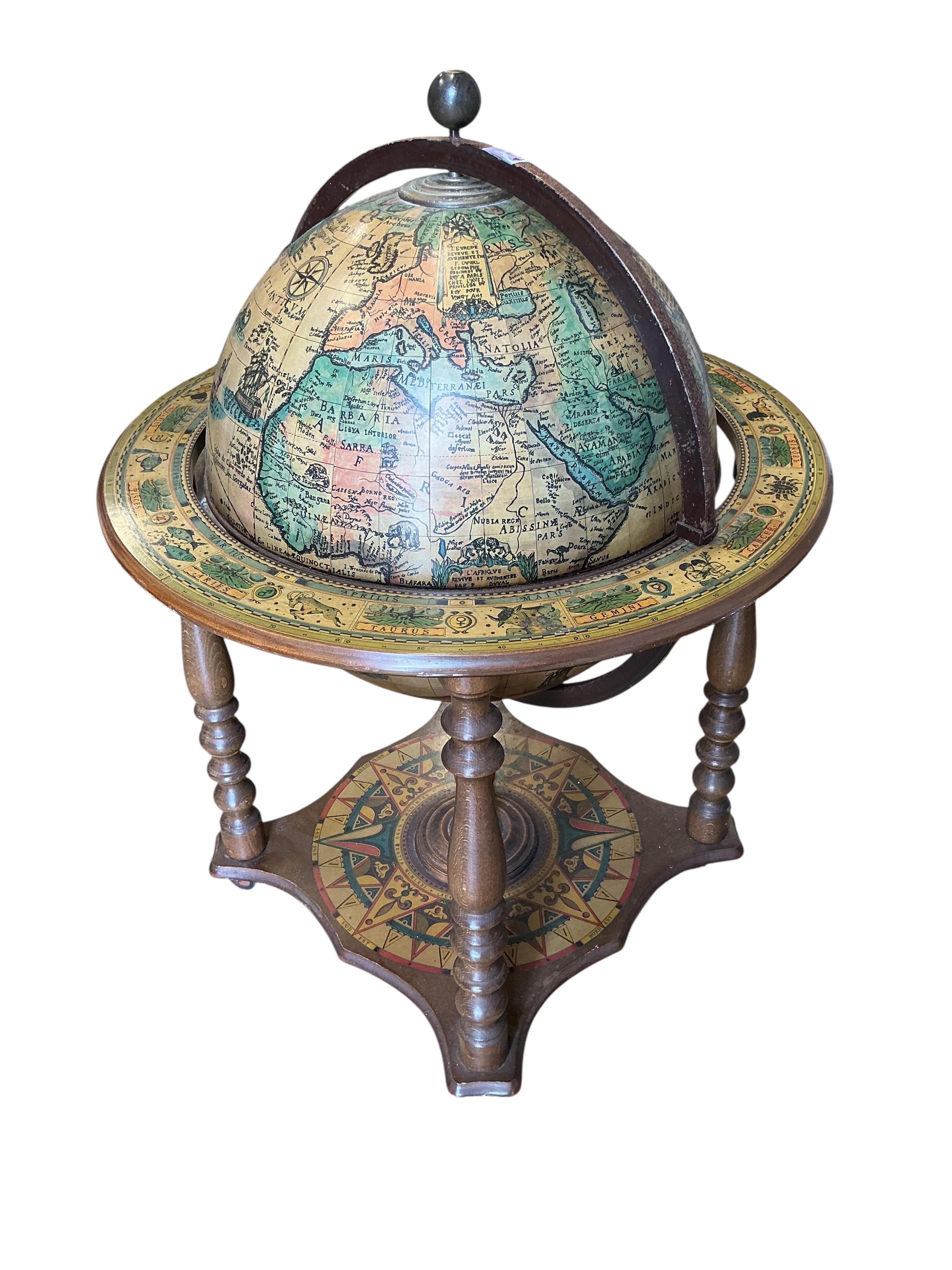 A globe; interior as a drinks cabinet, height 94cm